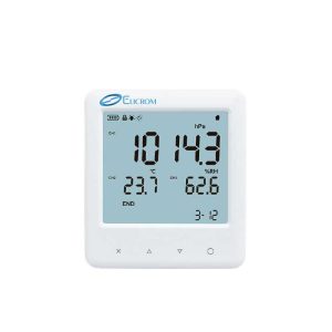 Digital environmental monitor displaying air pressure 1014.3 hPa, temperature 23.7°C, humidity 62.6%, and time 3:12 (Elcrom device)